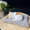 Tickles Sleeping Cat On Carpet Silicone Animal Toy for Kids Car Dashboard & Office Desk (Color: Orange & White Size: 8 cm)